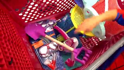 Roma and Diana play with dad on the beach