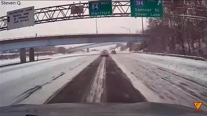 SUV spin out of control on I-91 under snowy conditions