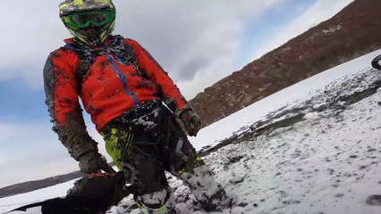 Motor Bike Riders Slip into Large Clay Pond