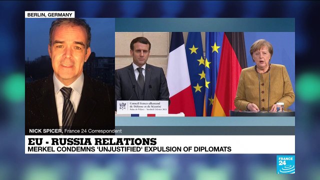 Germany’s Merkel condemns ‘unjustified’ expulsion of diplomats during summit with France’s Macron