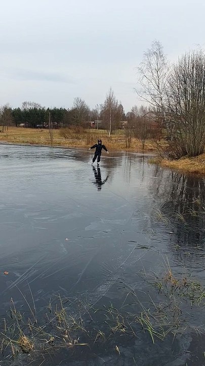 Man Ice Skating Finds Slim Spot in the Ice