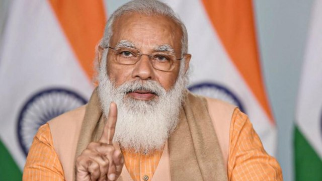 PM Modi unveils postage stamp on Gujarat High Court