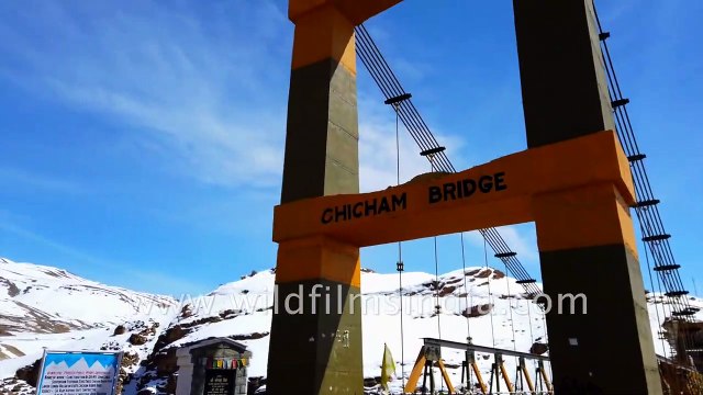 WildFilmsIndia crew help the locals in fixing the damaged road near Chicham Bridge