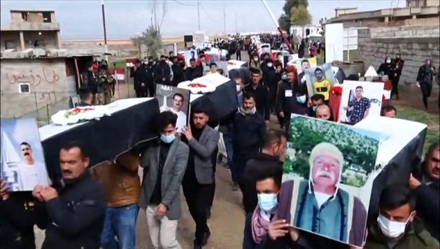 Formal burials take place of Yazidis murdered by the Islamic State