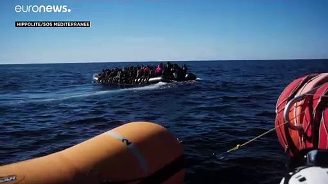 Hundreds of rescued migrants taken to Italian port, including eight with COVID-19