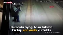 Caddeye savruldu, otomobilin altında kalmaktan son anda kurtuldu