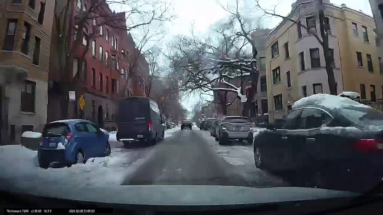 Bicycle Rides Straight Into Car at Icy Intersection