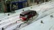 Nail biting video shows car slip and slide up Edinburgh's snowy Royal Mile