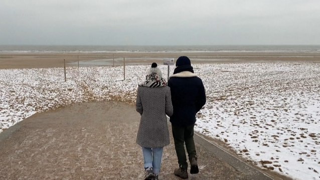 French beach painted white by snow