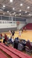 Kid Shoots Amazing Long Distance Shot During Basketball Game