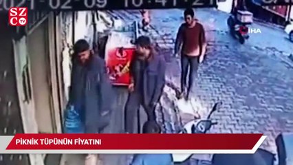 Piknik tüpünün fiyatını beğenmeyen saldırganın marketçiyi darp ettiği anlar kamerada