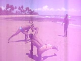 Capoeira masters practicing on a Brazilian beach Feb 08 2/2