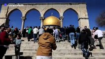 Palestinian Muslims attend Friday prayer at Al-Aqsa mosque compound