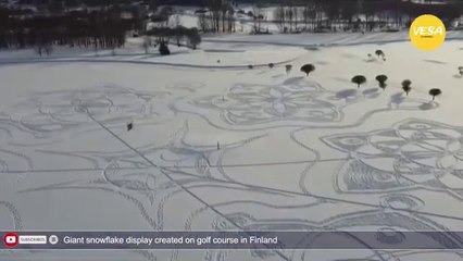 Giant snowflake display created on golf course in Finland