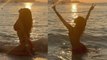 Mouni Roy ने Red Bikini पहन लगाई आग, समुद्र की लहरों के साथ खेलते हुए दिए Bold Pose । Boldsky