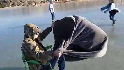 Man Enjoys a Ride in His Wind Drawn Sleigh