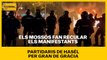 Els Mossos fan recular els manifestants partidaris de Pablo Hasél per Gran de Gràcia, a Barcelona