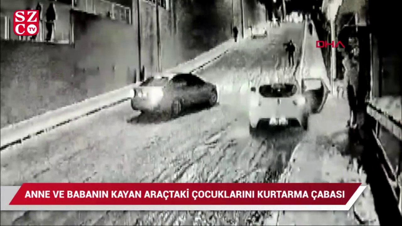 Anne ve babanın kayan araçtaki çocuklarını kurtarma çabaları kamerada