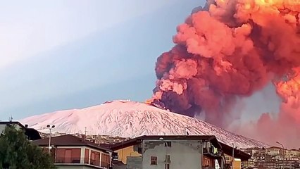 Spectacular plume of orange smoke rises from exploding Mount Etna