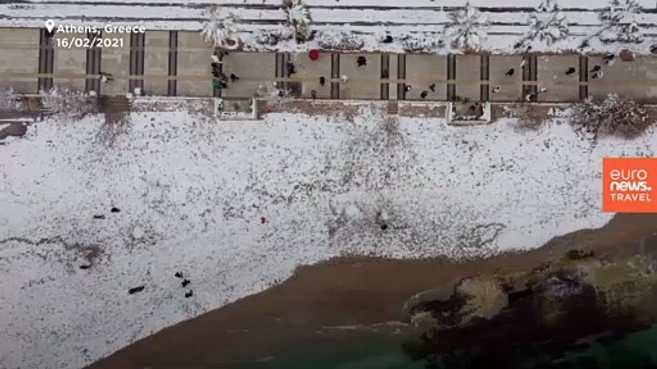 The iconic Acropolis in Athens is covered in snow for the first time in decades