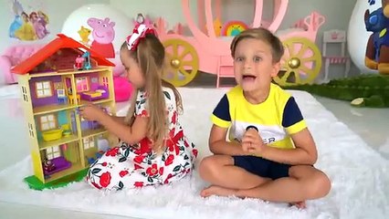 Diana and Roma play with Giant Surprise eggs