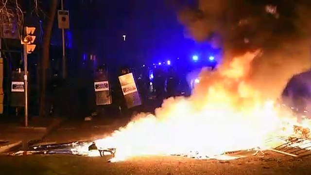 Fires, clashes for third night after Spain rapper protests