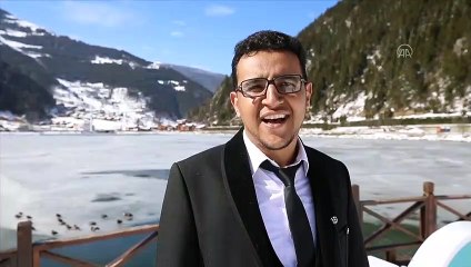 TRABZON - Buz tutan Uzungöl, günübirlik tatilcilerin ilgi odağı oldu
