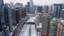 Downtown Chicago covered in snow and ice amid historic cold snap