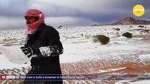 Man tries to build a snowman in Saudi Arabia desert