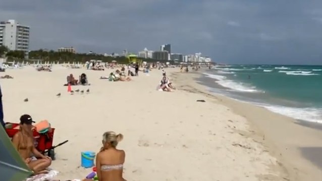 Floridians enjoy a sunny February day on the coast