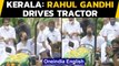 Rahul Gandhi drives tractor while attending rally in Kerala: Watch | Oneindia News