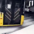 Bus drifting in snow