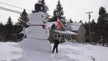 Taller than a house?! Huge snowman built in New York