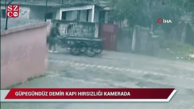 Güpegündüz demir kapı hırsızlığı kamerada