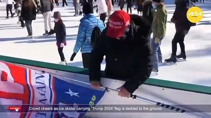 Crowd cheers as ice skater carrying Trump 2024 flag is tackled to the ground