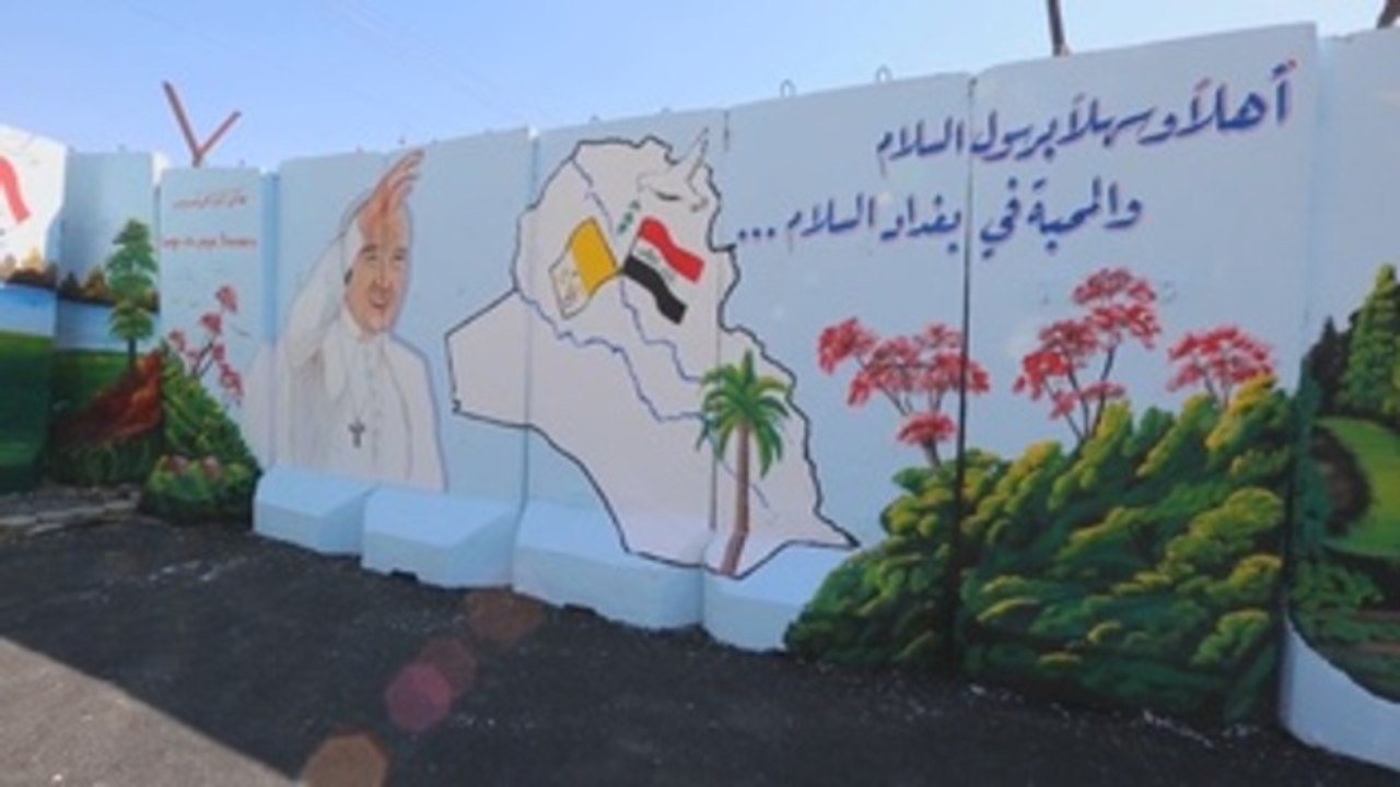 Murales para recibir a Francisco en Bagdad y decorar los muros de seguridad