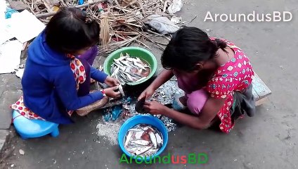 cutting fish village kids