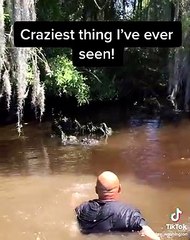 Swamp Man Throws Massive Wild Alligator