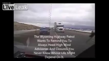 LiveLeak - Strong Wind Blows Truck Onto Cop Car