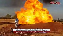من عمليات إطفاء النيران المشتعلة بخط الغاز العربي بعد تعرضه لاعتداء إرهابي