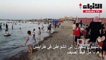 الليبيون يلجأون إلى الشواطئ في طرابلس هربا من قيظ الصيف