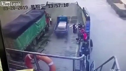 Truck launched off of ferry into river. CHINA 2019