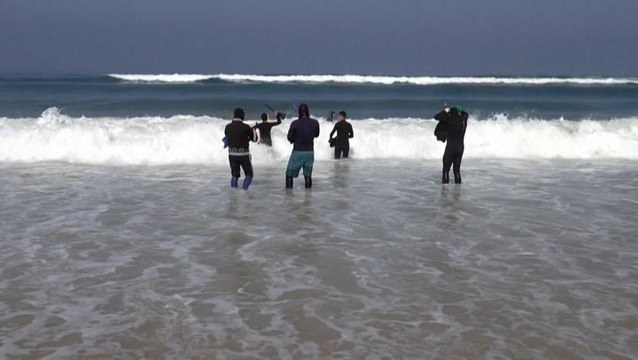 Gaza Strip divers volunteer to search for sailors missing after storm
