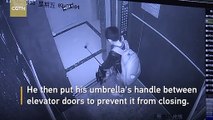 Boy uses umbrella to prevent elevator door from closing causes free fall