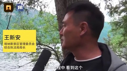 Man captures footage of unknown creature in Chinese lake - Daily Mail