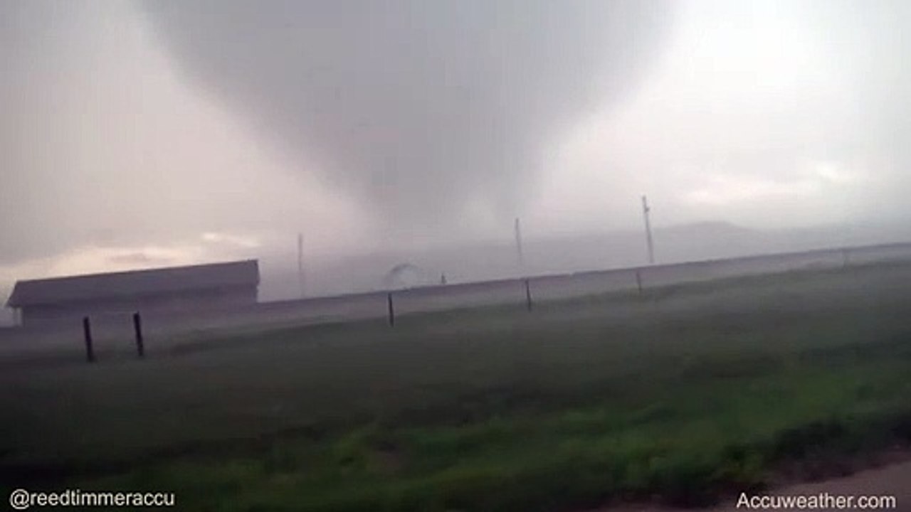 INTENSE close-range tornado lofts COWS into the air damages homes northwest of Cheyenne WY