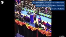 University of Florida apologizes after professor pushes students at graduation