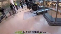 Incredible footage of biker racing through shopping mall