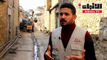 شباب الموصل يزيلون الركام من الشوارع