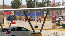 Asylum seekers cross US-Mexico border under 'Remain in Mexico' policy rollback